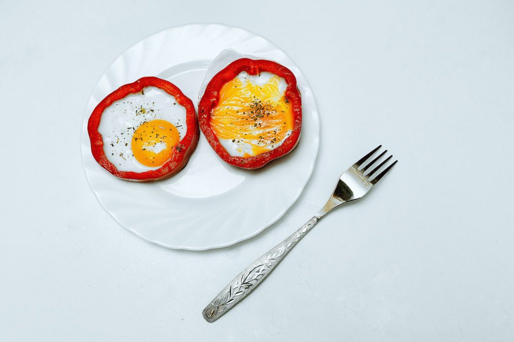 egg in red plastic container