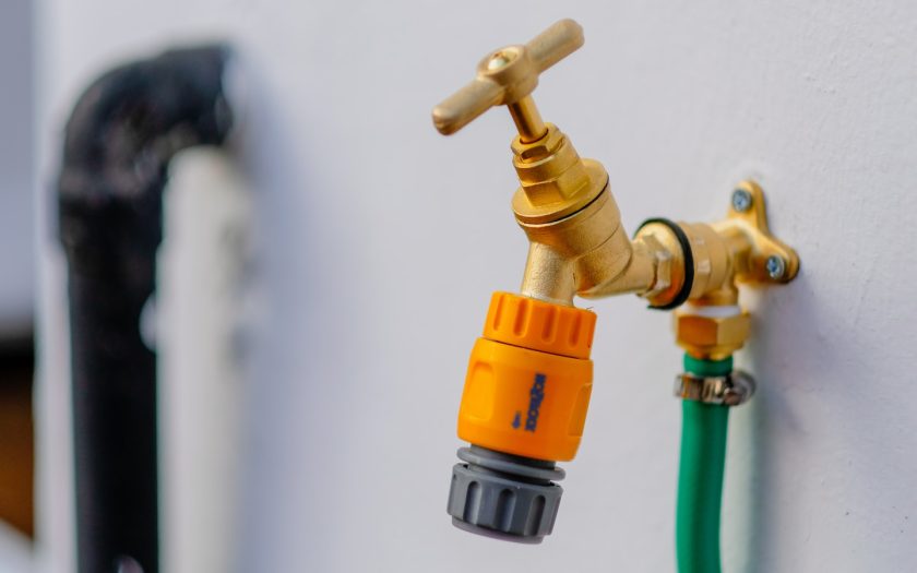 brass-colored faucet