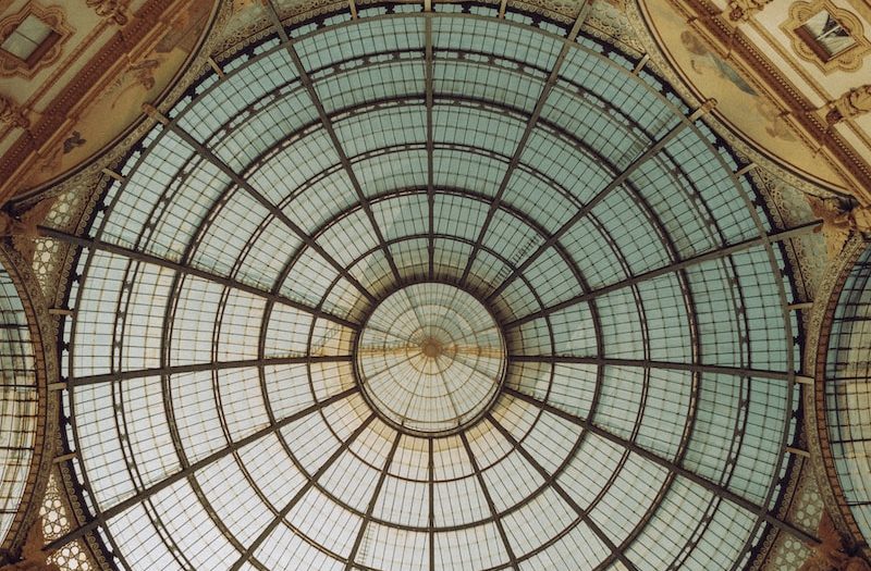 the ceiling of a building with a glass dome