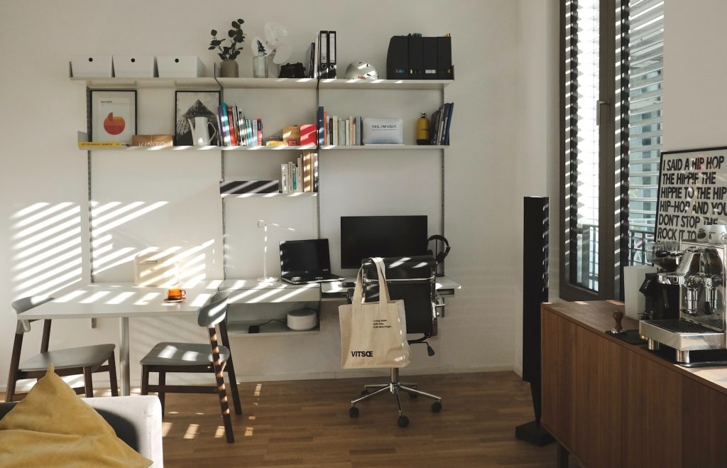 a room filled with furniture and a table