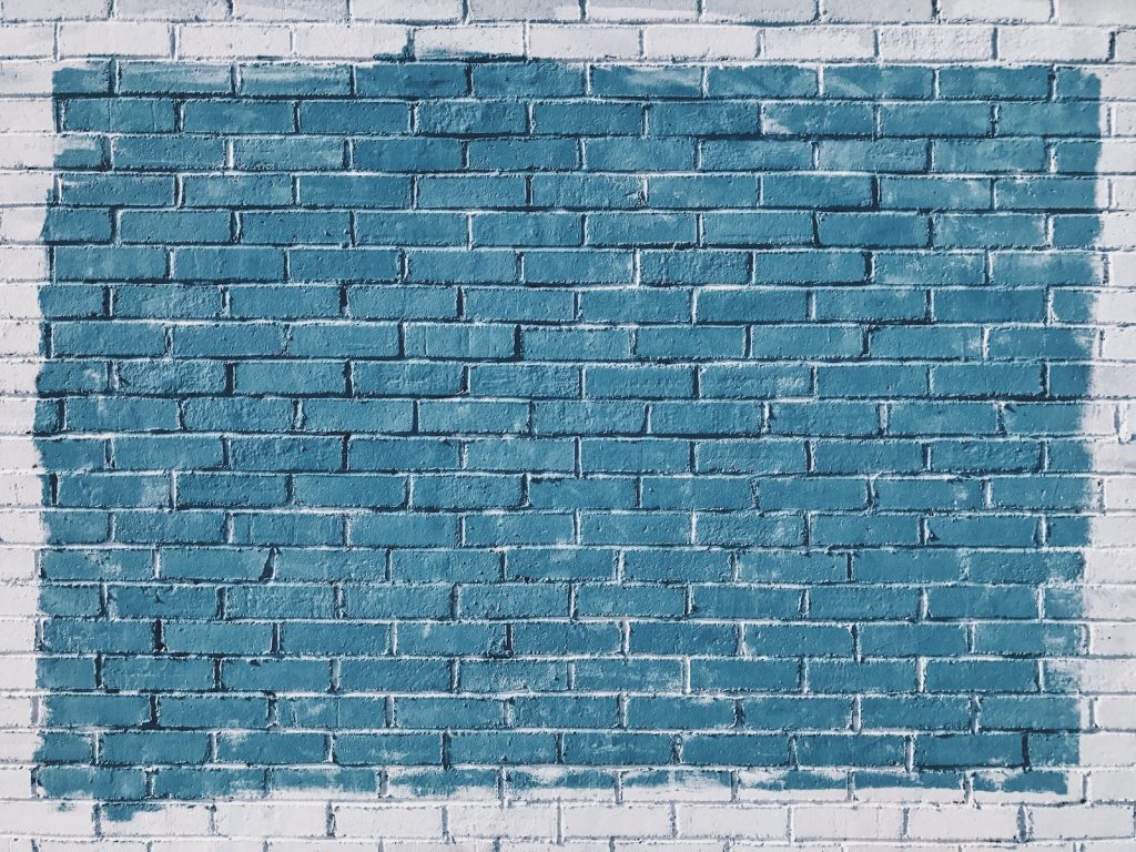 gray concrete bricks painted in blue