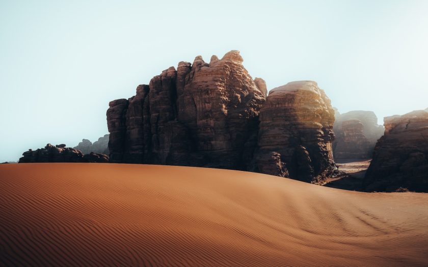 a desert landscape with rocks and sand